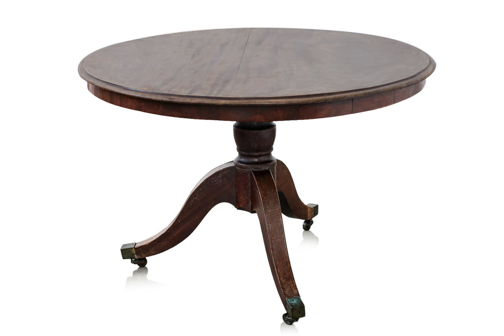 A REGENCY MAHOGANY BREAKFAST TABLE