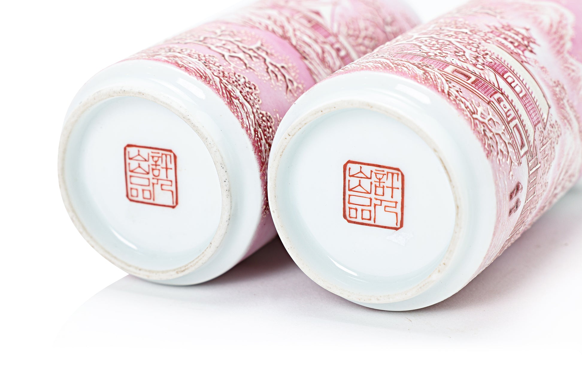 A PAIR OF SMALL PINK ENAMELLED WINTER LANDSCAPE VASES