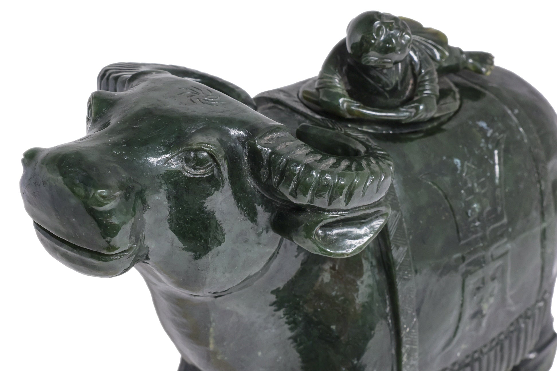 A LARGE SPINACH JADE BUFFALO AND BOY VESSEL
