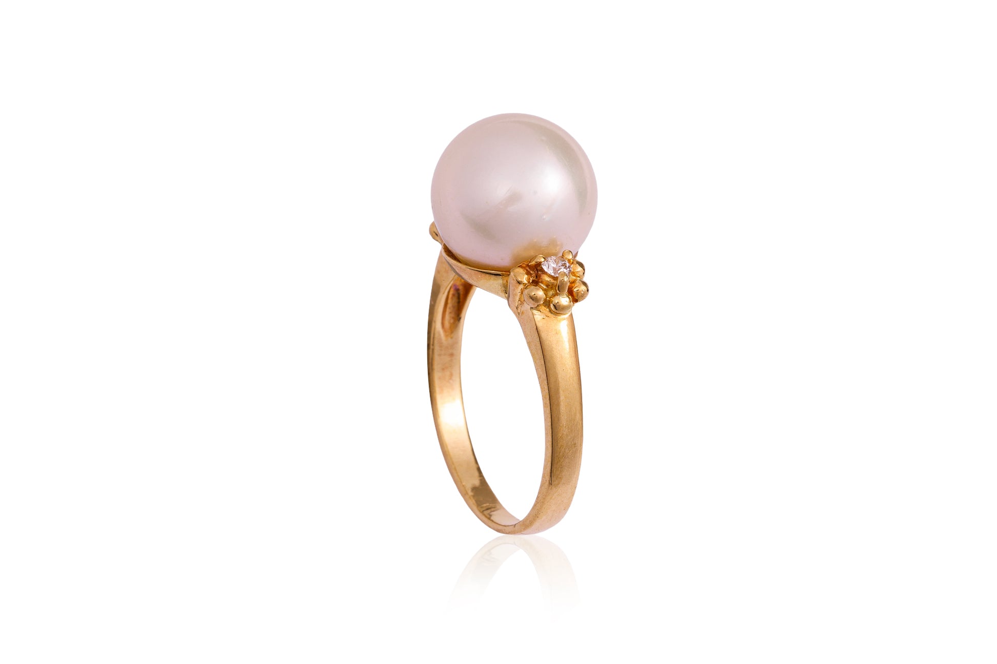 A CULTURED PEARL AND DIAMOND RING
