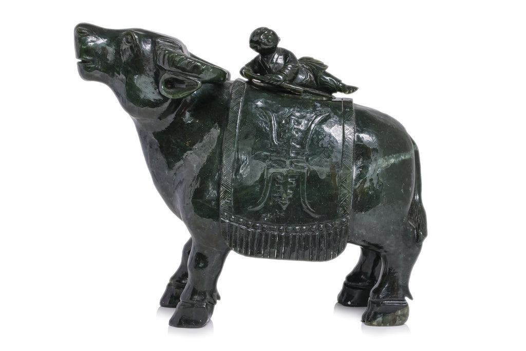 A LARGE SPINACH JADE BUFFALO AND BOY VESSEL