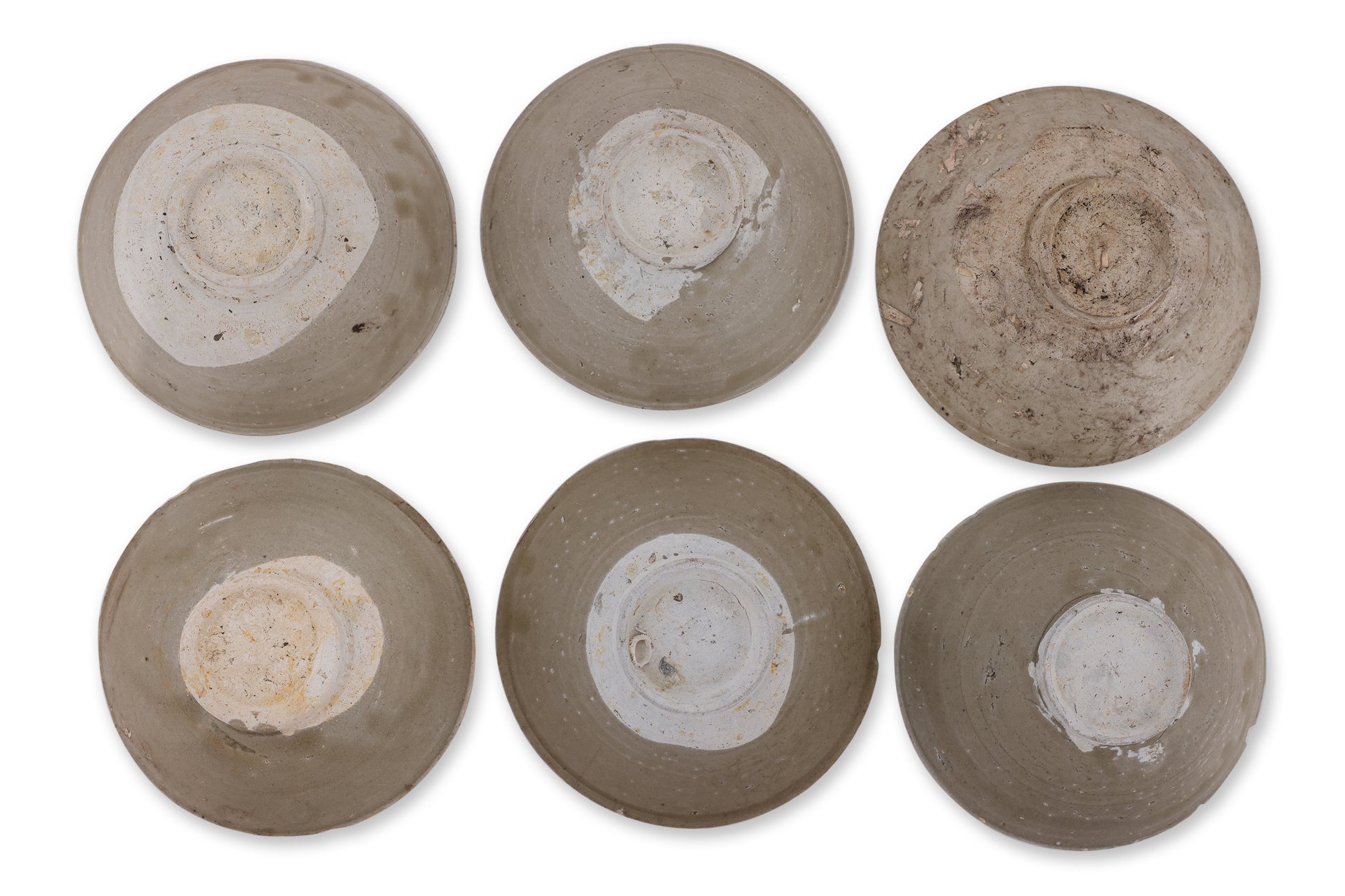 A GROUP OF SIX OLIVE-GREEN GLAZED BOWLS