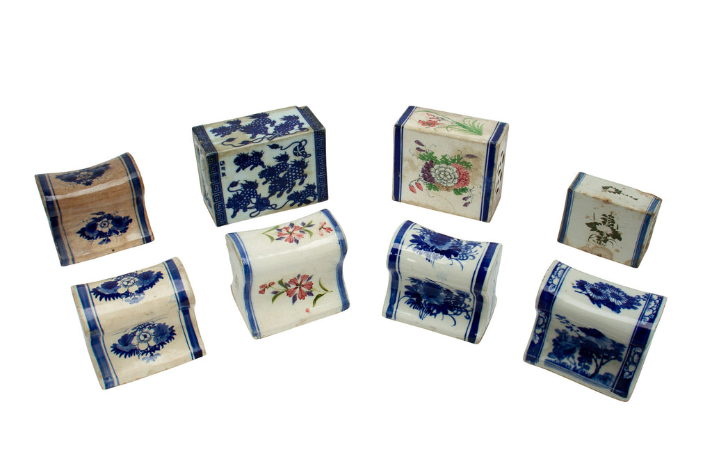 A GROUP OF EIGHT PORCELAIN PILLOWS