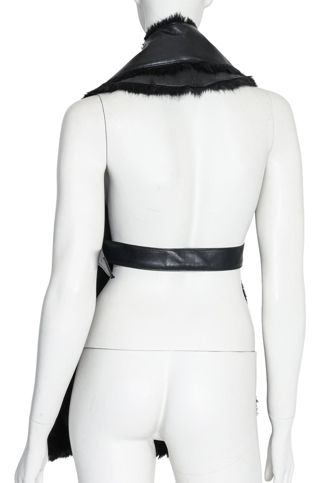 NOIR KEI NINOMIYA - A SYNTHETIC LEATHER AND FAUX FUR VEST, FALL RTW 2019