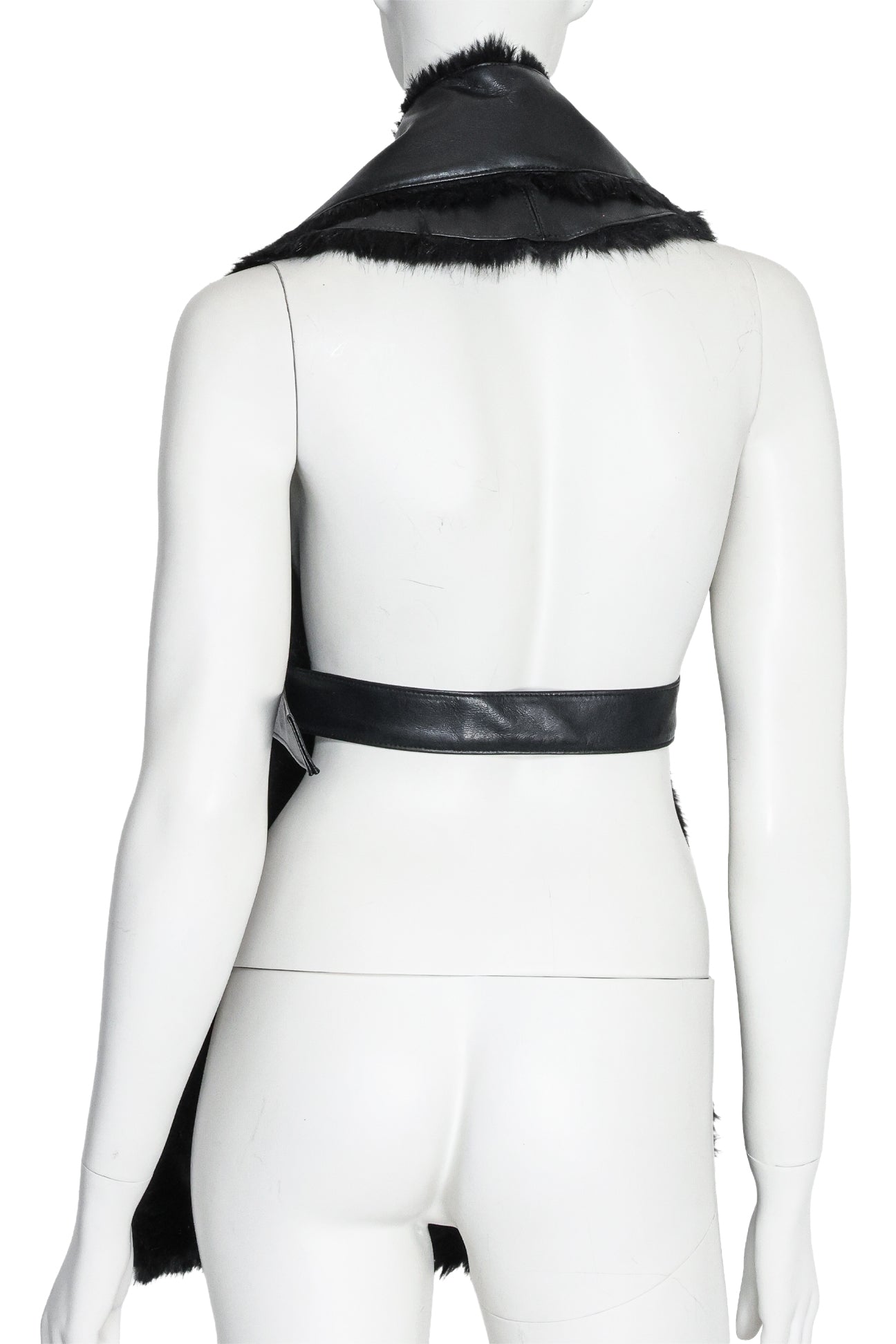 NOIR KEI NINOMIYA - A SYNTHETIC LEATHER AND FAUX FUR VEST, FALL RTW 2019