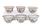A SET OF 11 PORCELAIN TEA BOWLS