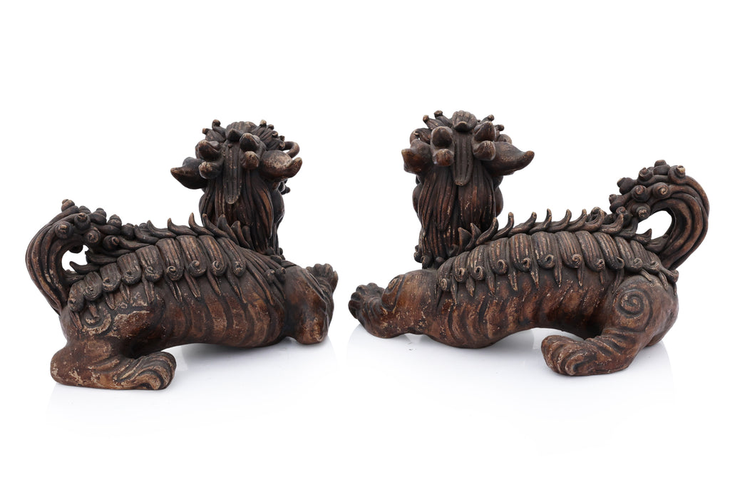A PAIR OF SHIWAN POTTERY FOO LIONS