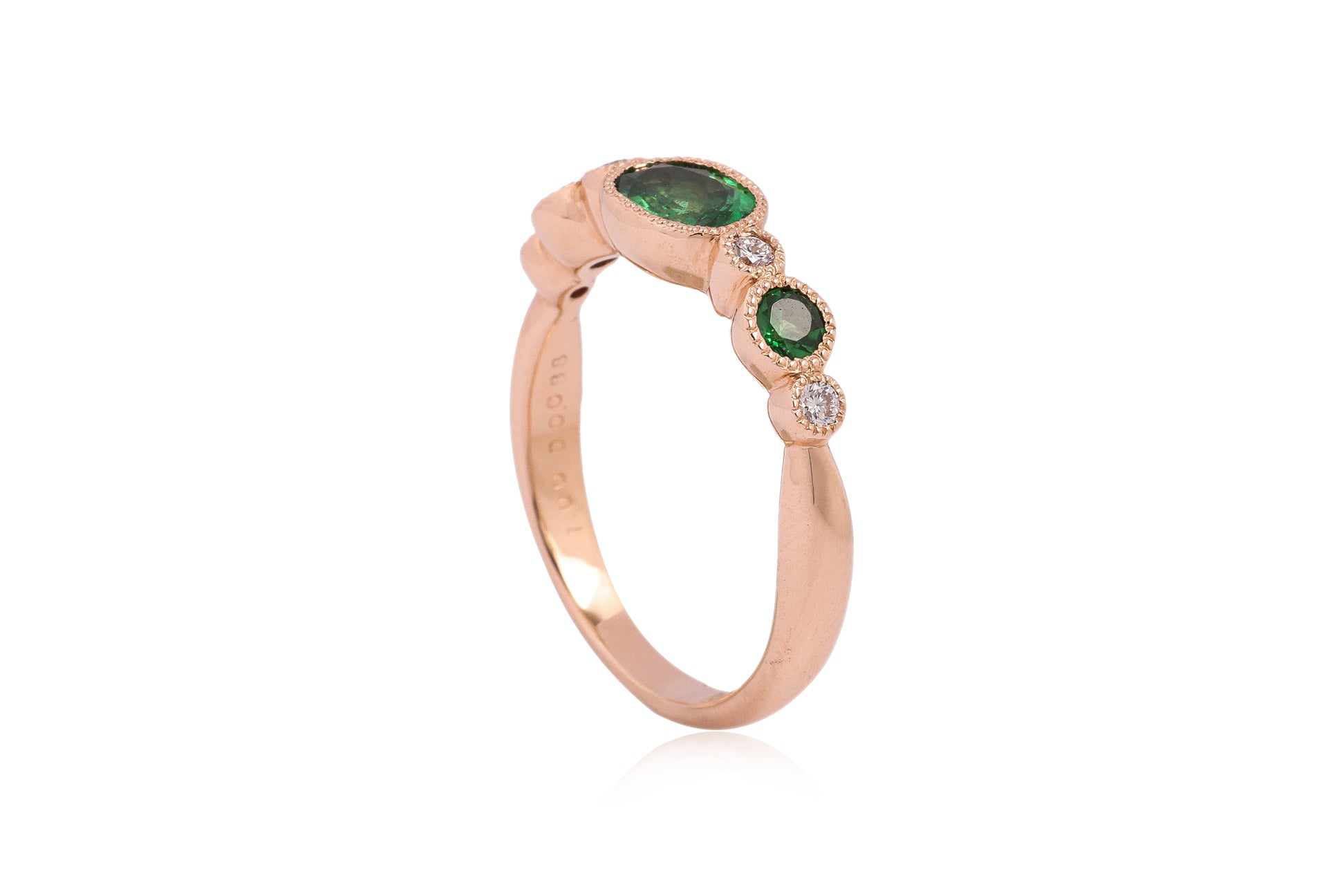 A TSAVORITE AND DIAMOND RING