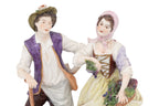 A GROUP OF FOUR RUDOLF KAMMER VOLKSTEDT PORCELAIN FIGURES