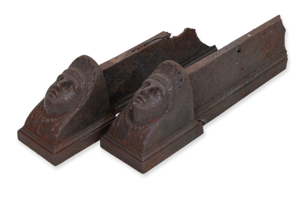 A PAIR OF FRENCH CAST IRON FIRE DOGS