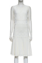 ALEXANDER MCQUEEN - A WHITE SLEEVELESS KNIT DRESS
