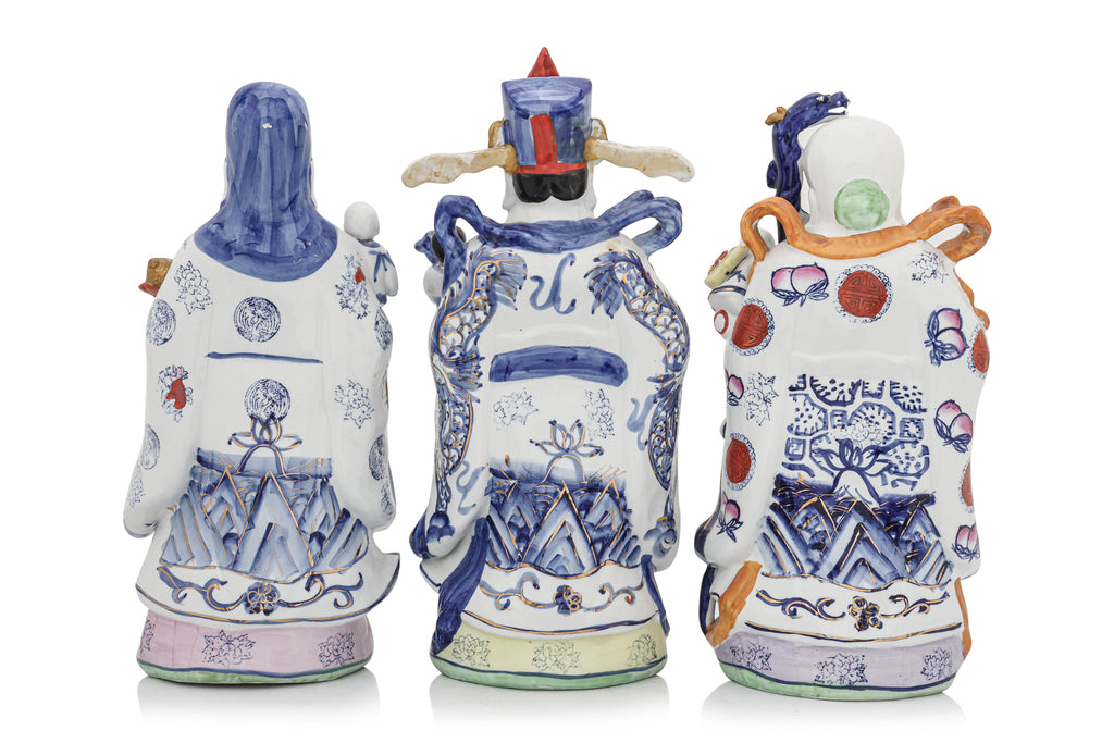 A SET OF THREE CHINESE PORCELAIN FU, LU, SHOU FIGURES