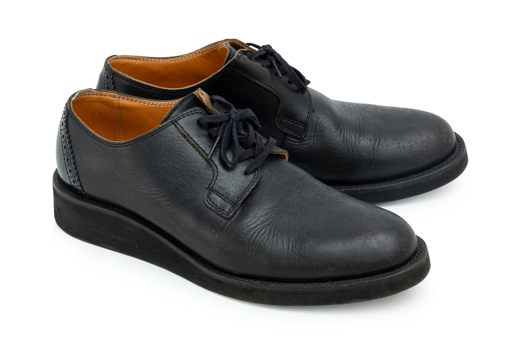 COMME DES GARÇONS - A PAIR OF BLACK LEATHER DERBY SHOES