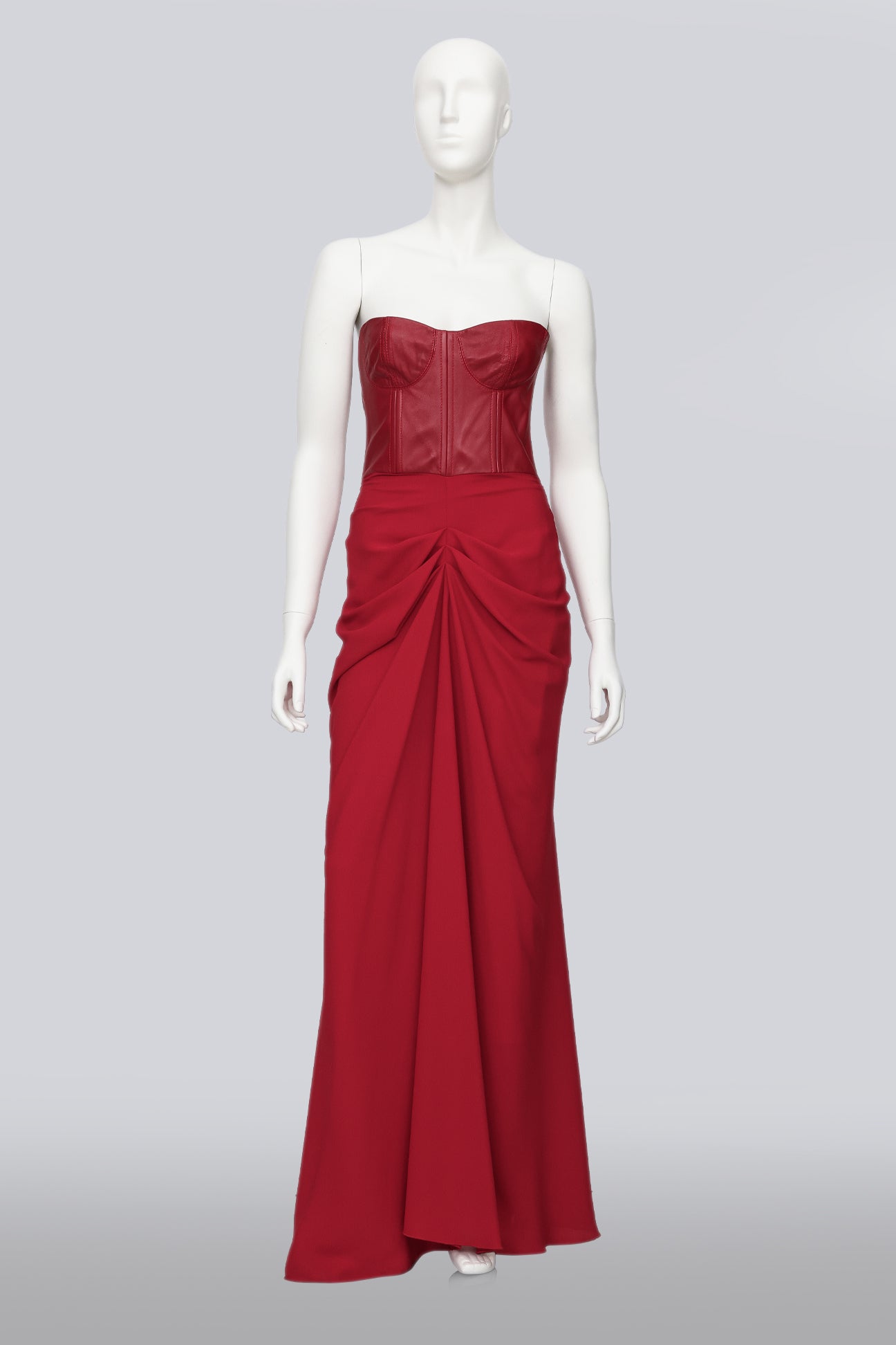 SANDRA WEIL - A RED STRAPLESS DRESS WITH LEATHER BODICE