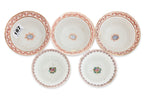 A GROUP OF FIVE FAMILLE ROSE 'MAGPIE' TEA BOWLS