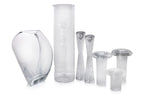 A GROUP OF EUROPEAN GLASS CANDLESTICKS AND VASES