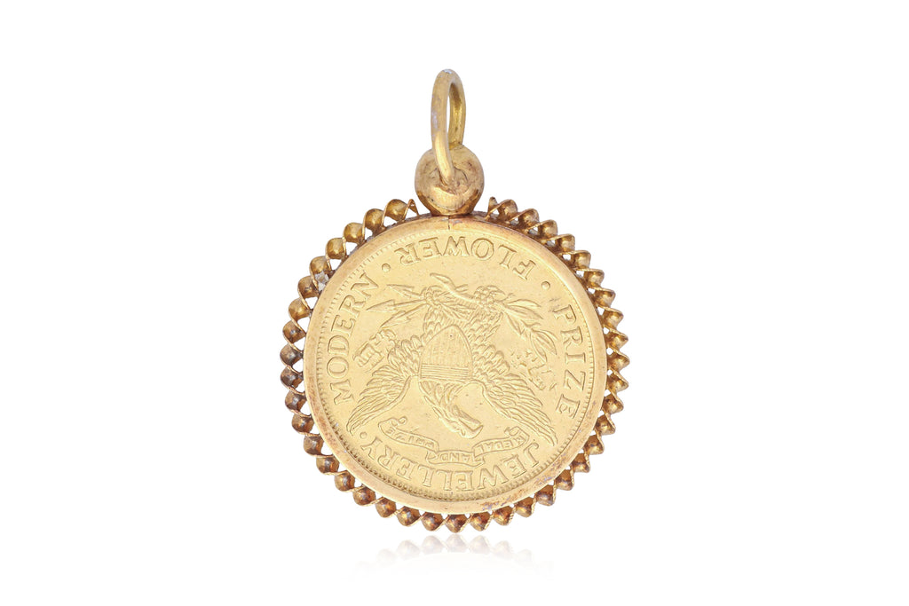 A PRIZE JEWELLERY MODERN FLOWER GOLD PENDANT