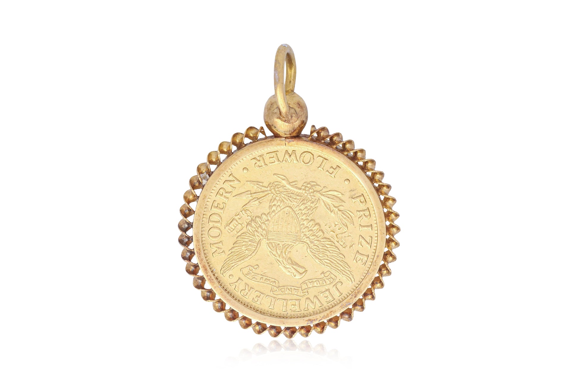 A PRIZE JEWELLERY MODERN FLOWER GOLD PENDANT