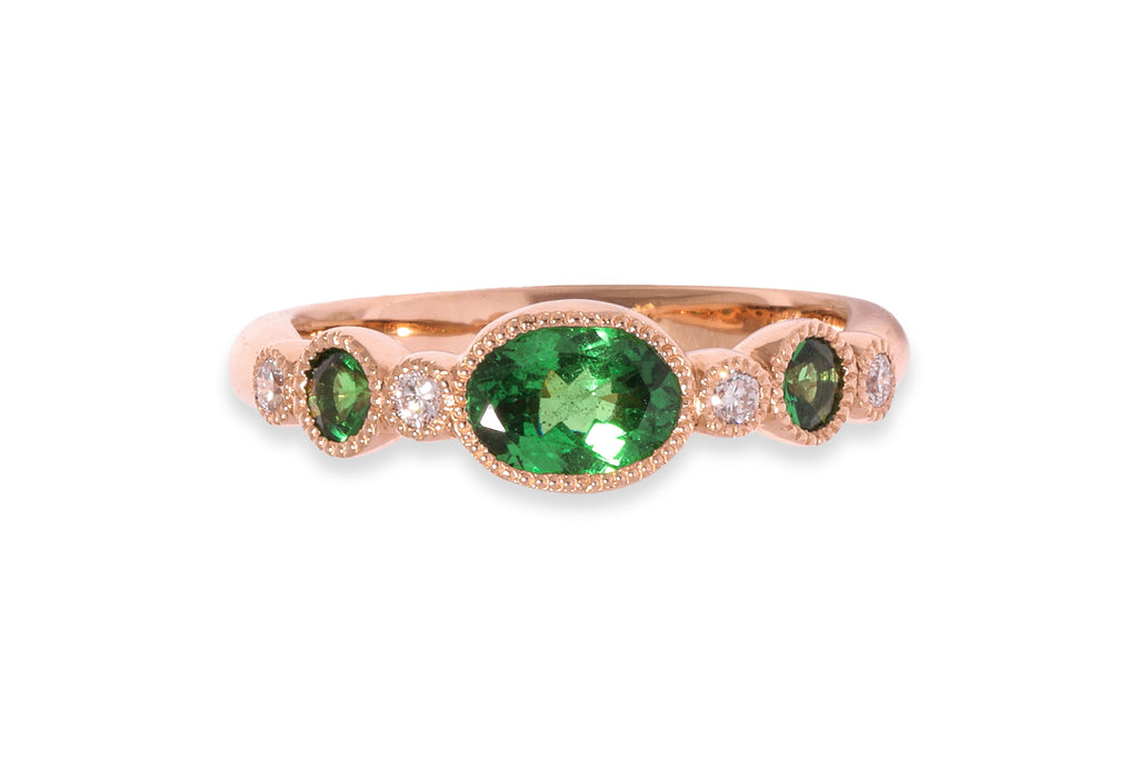 A TSAVORITE AND DIAMOND RING