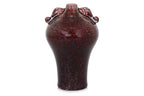 A FLAMBE VASE WITH ELEPHANT LUGS