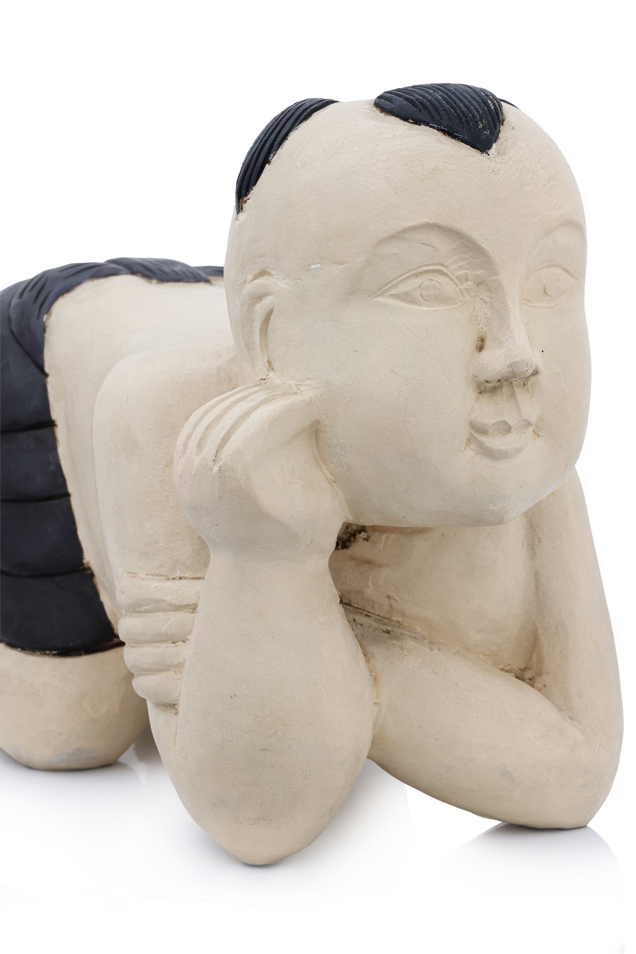 A LARGE CARVED AND PAINTED FIGURE OF A BOY