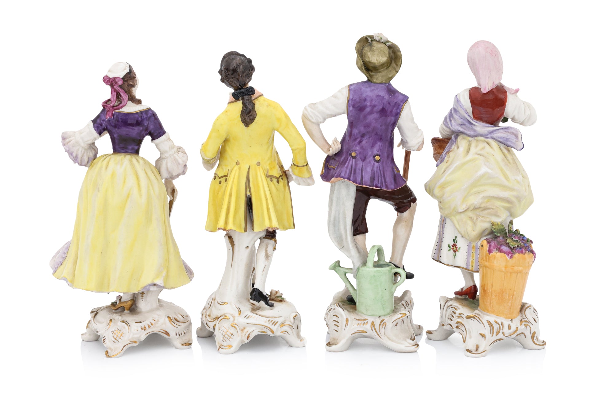 A GROUP OF FOUR RUDOLF KAMMER VOLKSTEDT PORCELAIN FIGURES