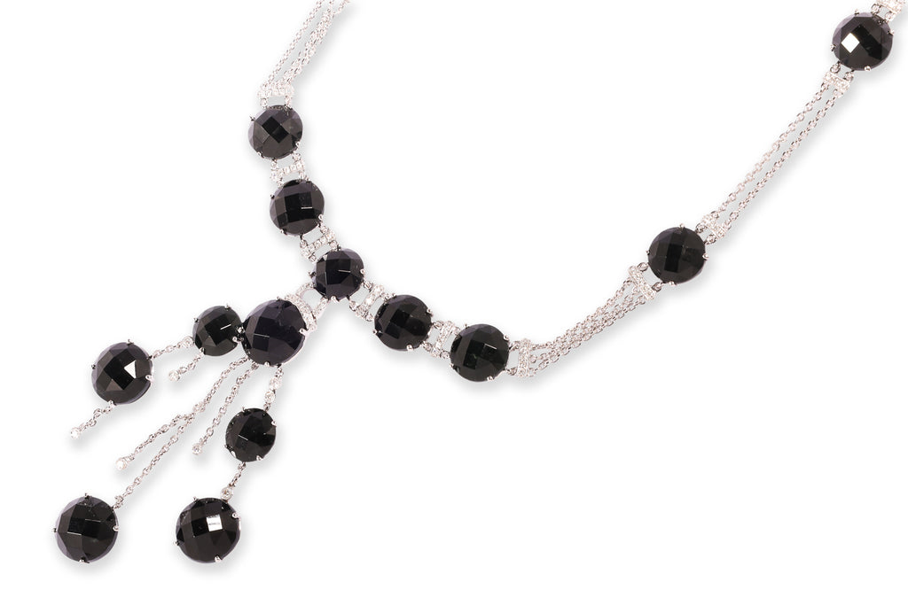 A BLACK JADE AND DIAMOND NECKLACE
