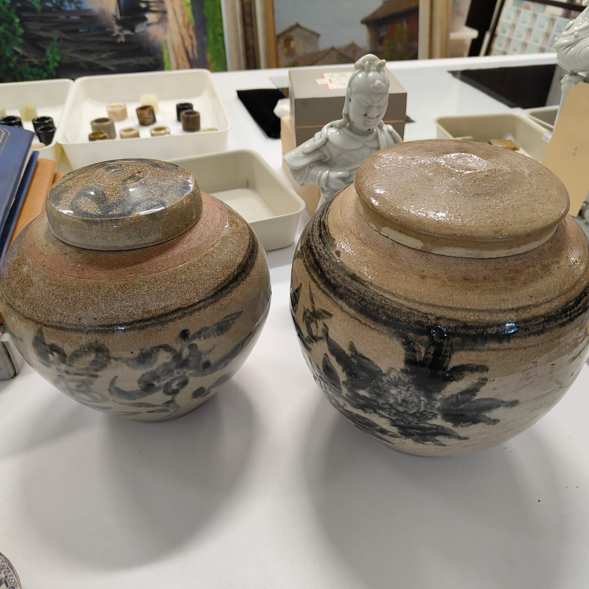 TWO BLUE AND WHITE JARS AND COVERS