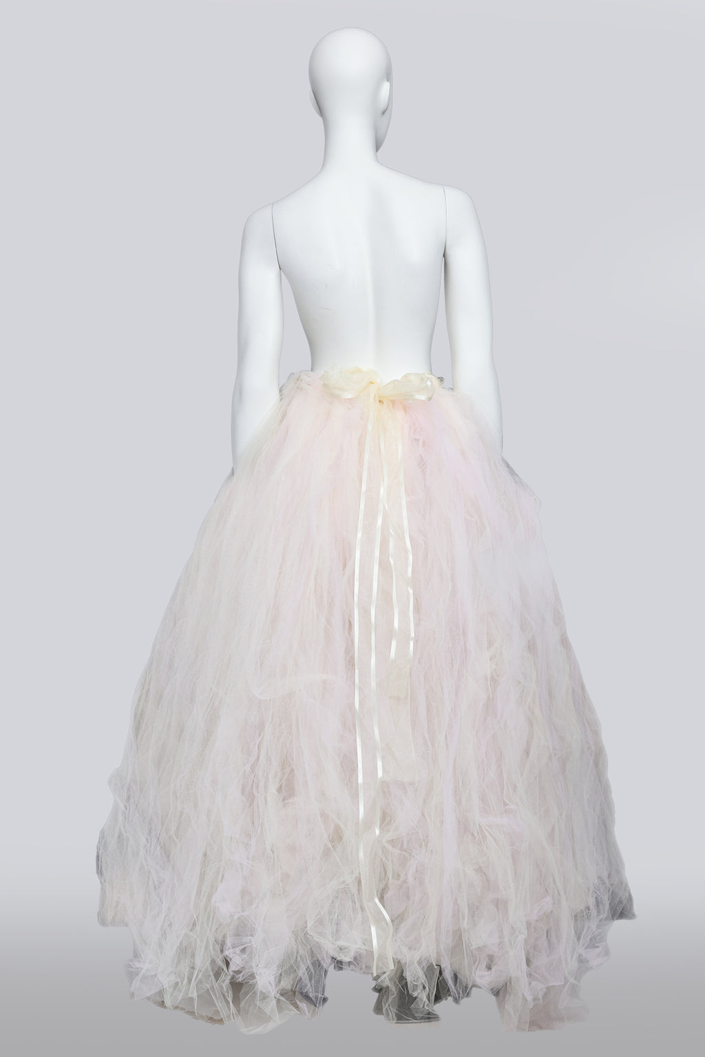 A LARGE PALE PINK AND WHITE TULLE SKIRT