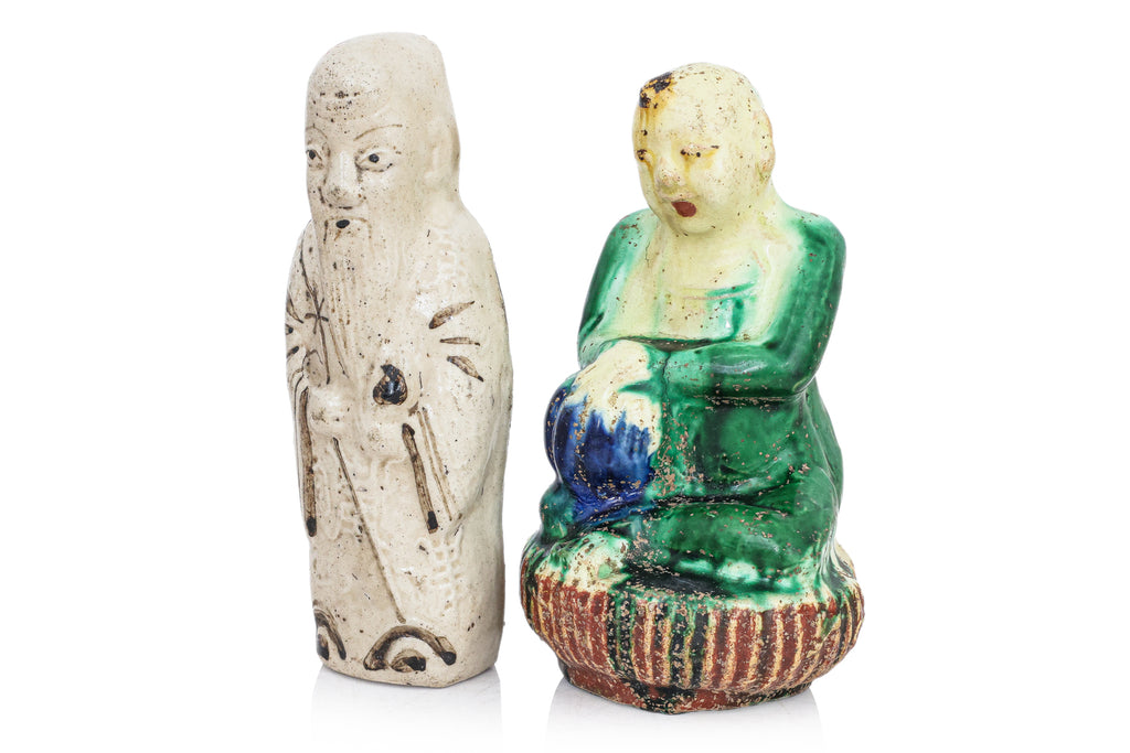 A GROUP OF SIX POTTERY FIGURES