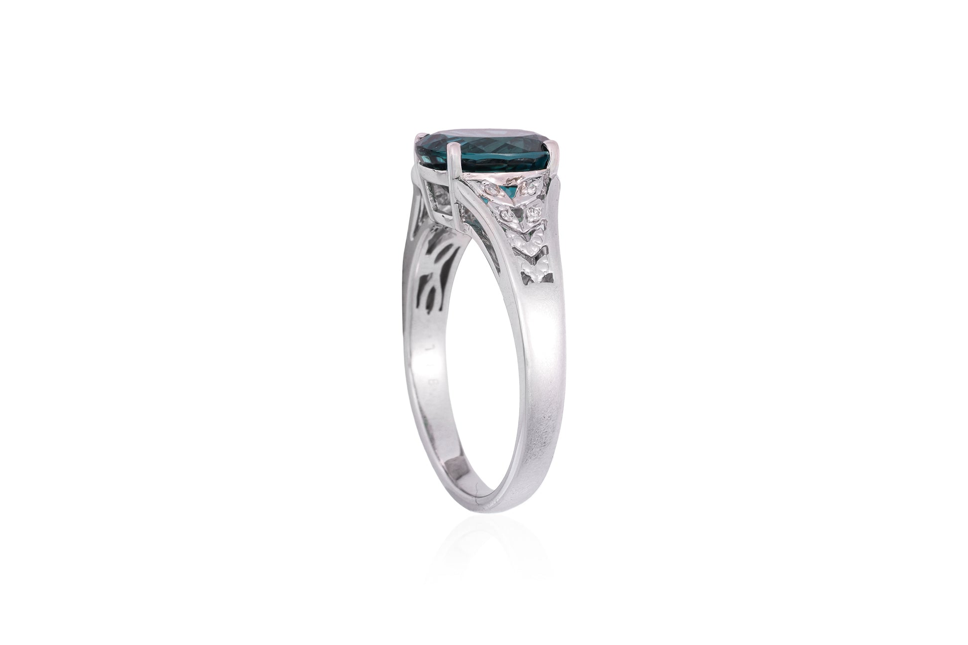 A GREENISH-BLUE TOURMALINE AND DIAMOND RING