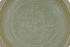 A LARGE CARVED LONGQUAN CELADON DISH