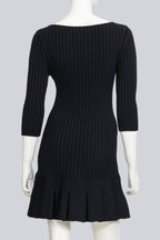 KHAITE - A BLACK RIBBED KNIT DRESS