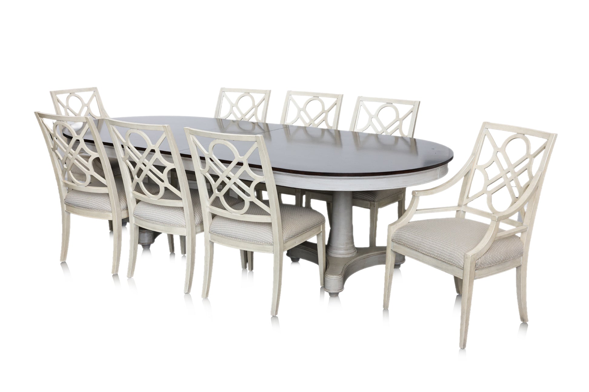 A LARGE EXTENDING OVAL DINING TABLE AND EIGHT CHAIRS