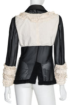 COMME DES GARÇONS - A SHEER PADDED COAT