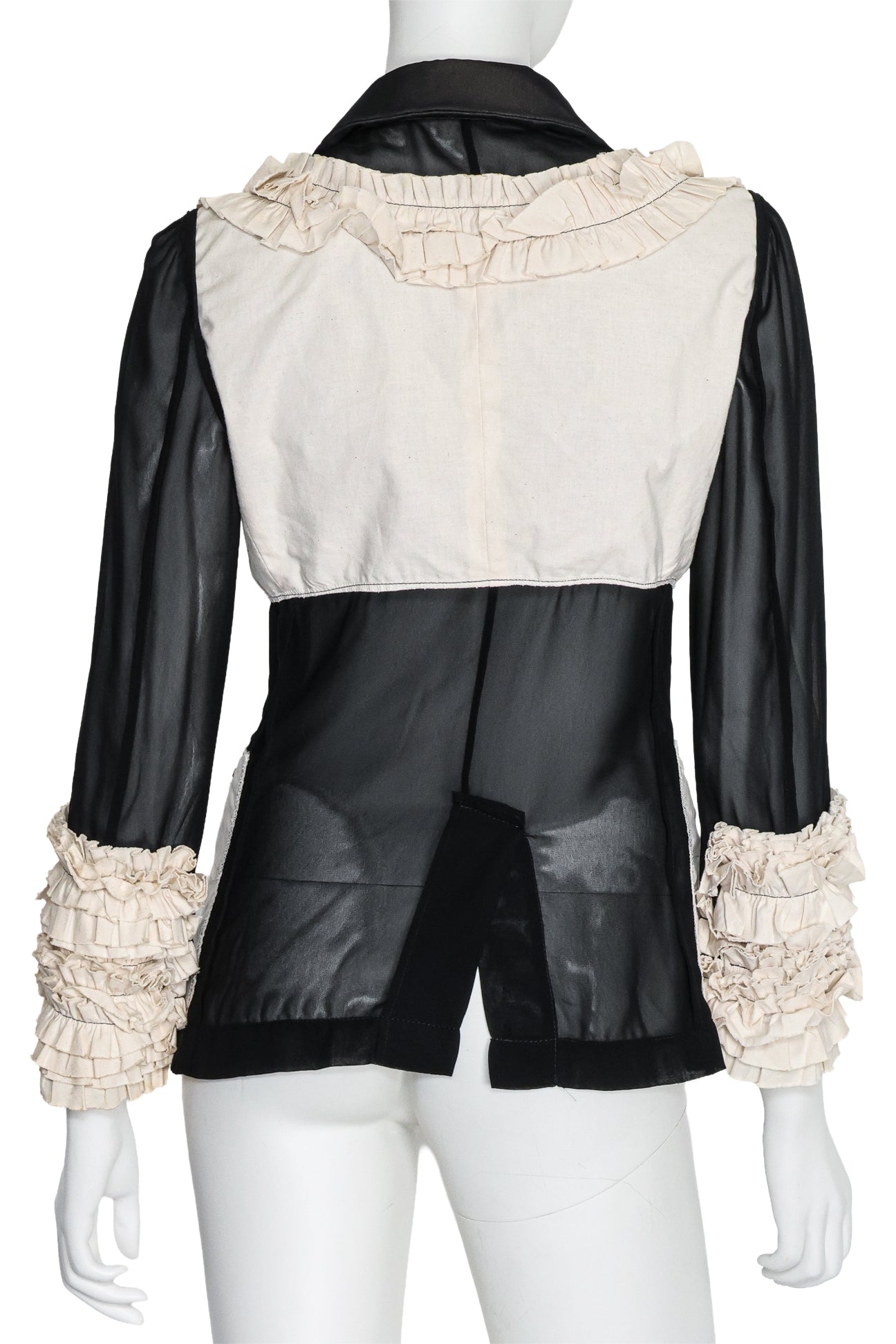 COMME DES GARÇONS - A SHEER PADDED COAT
