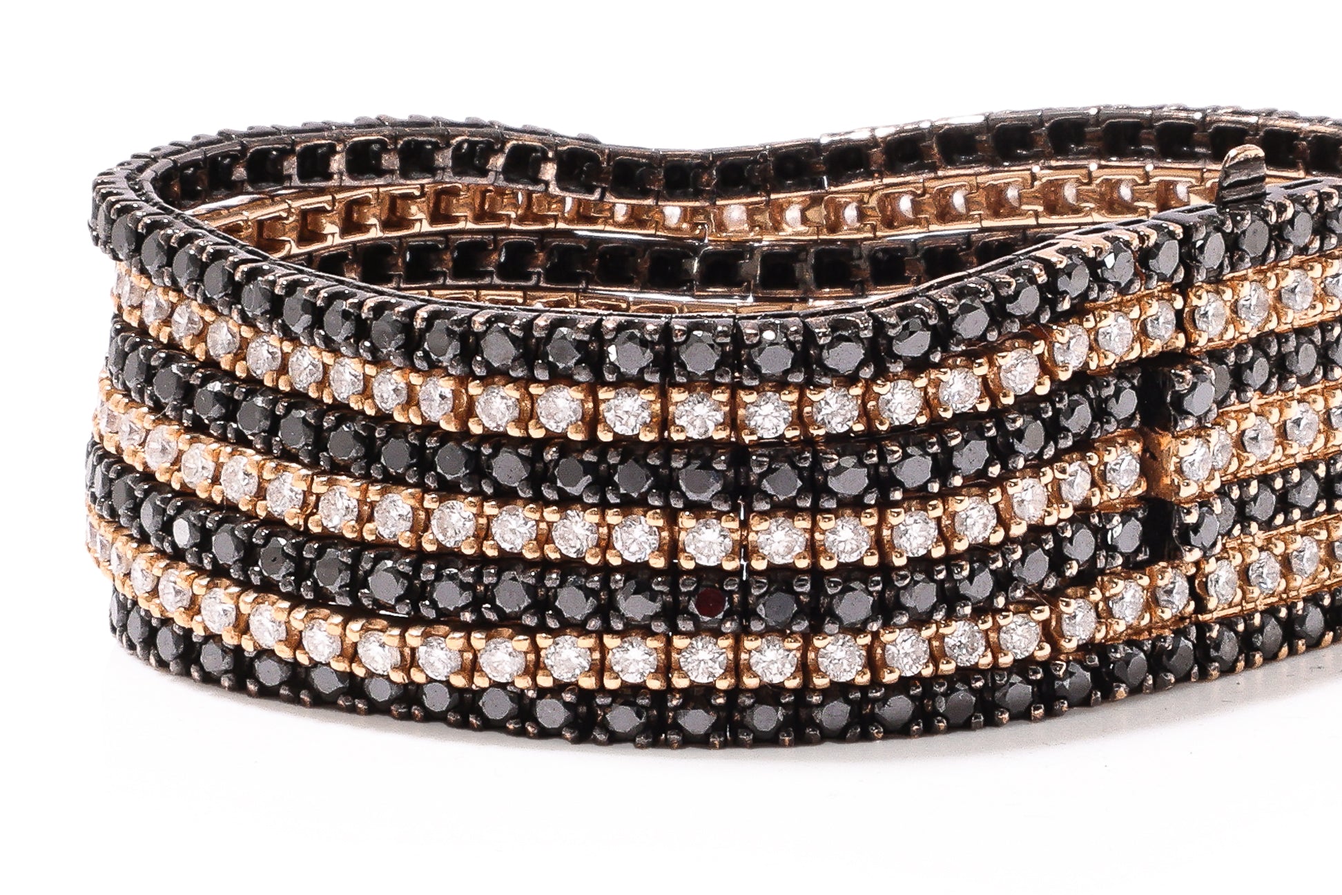 A MULTI-ROW DIAMOND AND BLACK DIAMOND BRACELET WITH MATCHING RING