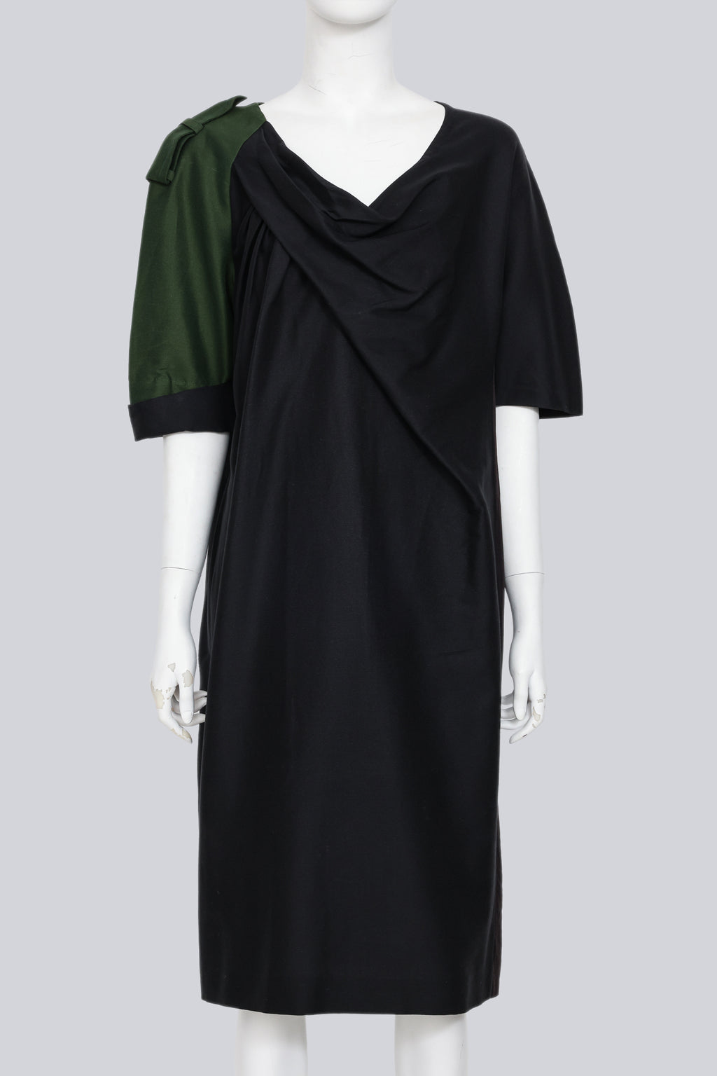 DRIES VAN NOTEN - A BLACK DRESS WITH SINGLE GREEN SLEEVE