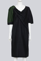 DRIES VAN NOTEN - A BLACK DRESS WITH SINGLE GREEN SLEEVE