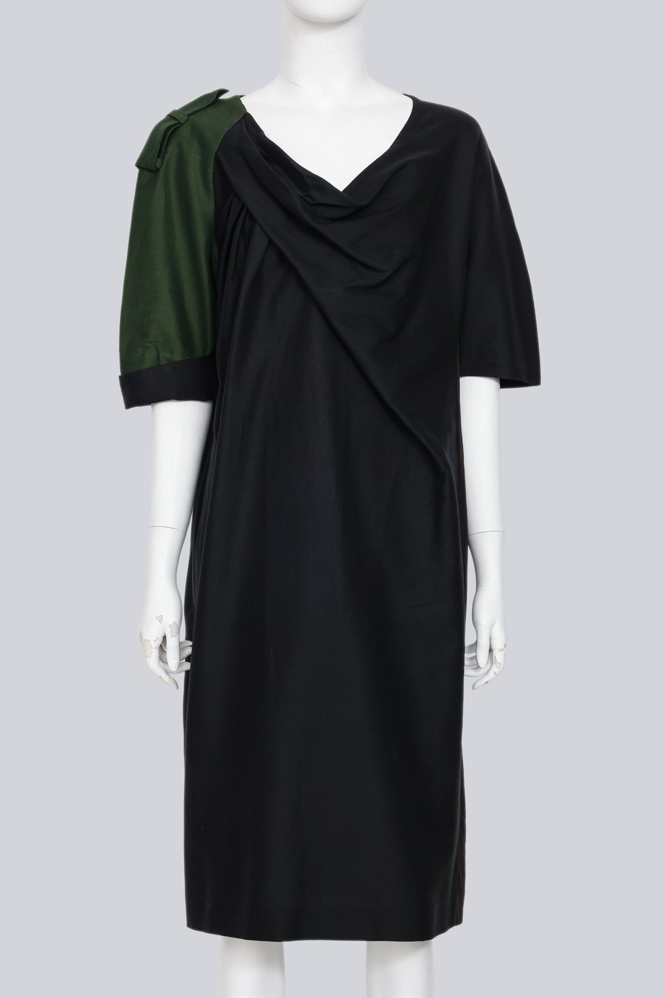 DRIES VAN NOTEN - A BLACK DRESS WITH SINGLE GREEN SLEEVE