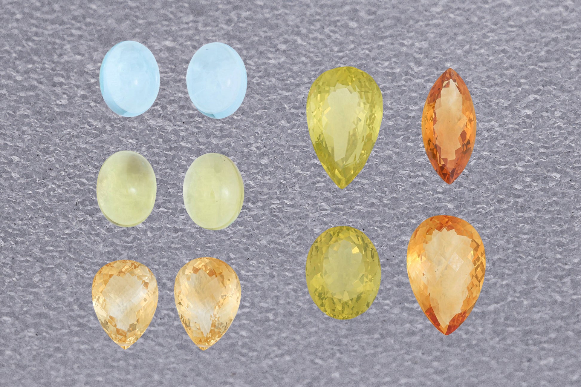 A GROUP OF ASSORTED CUT GEMSTONES