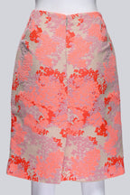 CAROLINA HERRERA - AN ORANGE FLORAL SKIRT