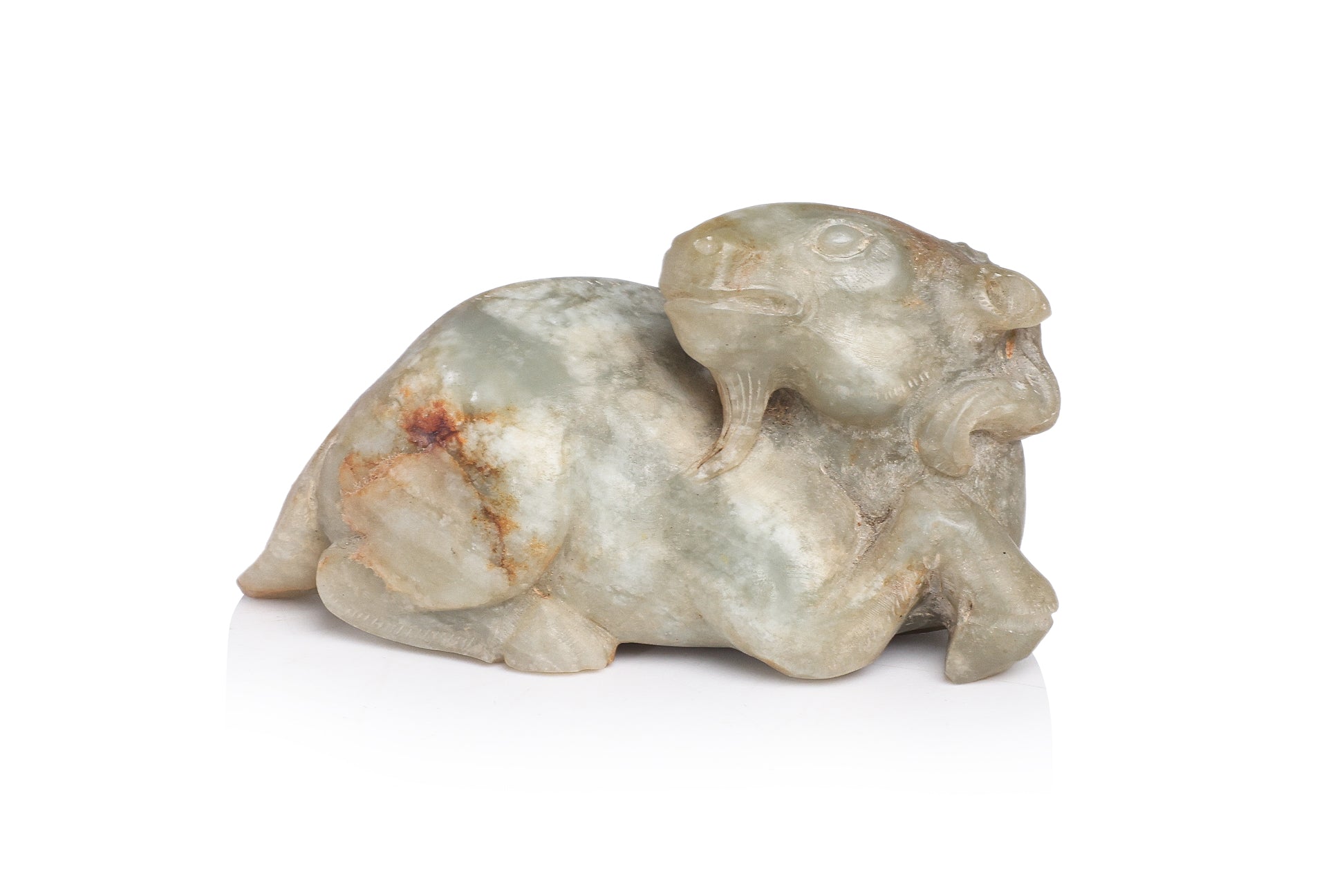 A JADE CARVING OF A RAM