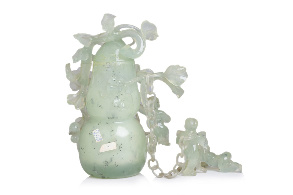 A SERPENTINE JADE DOUBLE GOURD VASE AND COVER