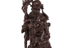 A CARVED HARDWOOD FIGURE OF SHOULAO