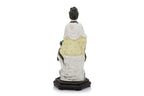 A POLYCHROME-ENAMELLED PORCELAIN FIGURE OF A WOMAN AND BIRD