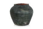 A LARGE GREEN GLAZED POTTERY JAR