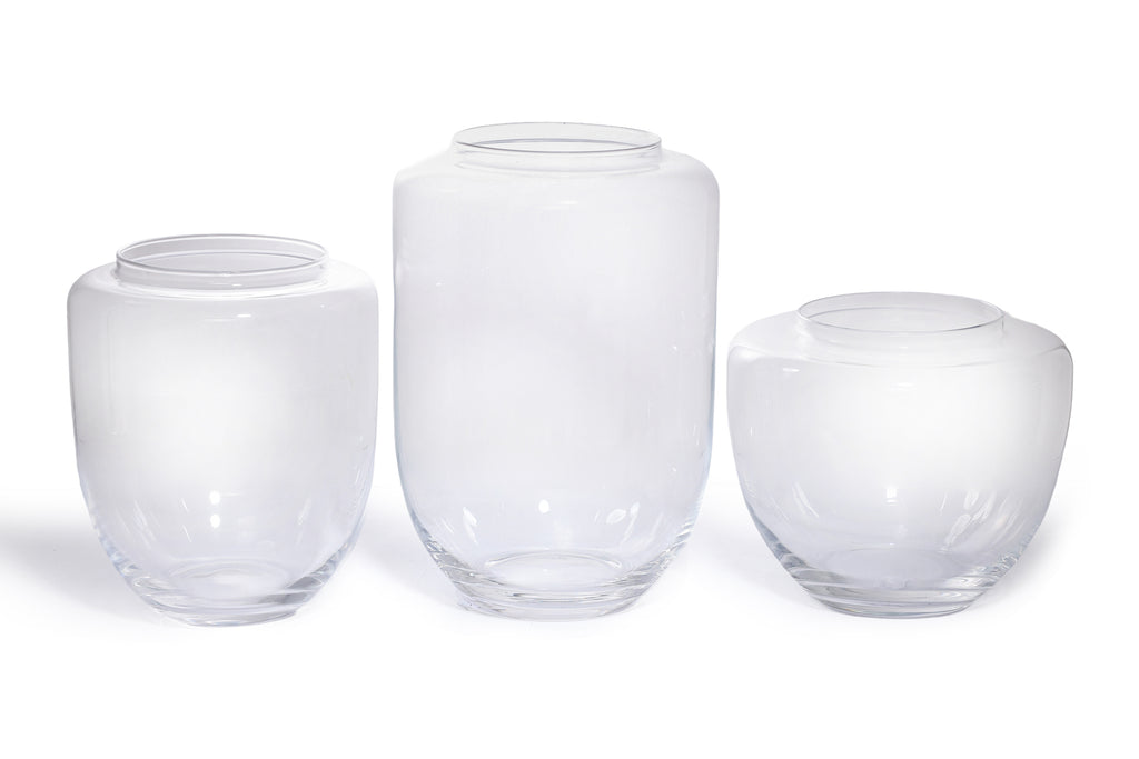 A GROUP OF THREE IVV GLASS JARS WITH COLOURED LIDS