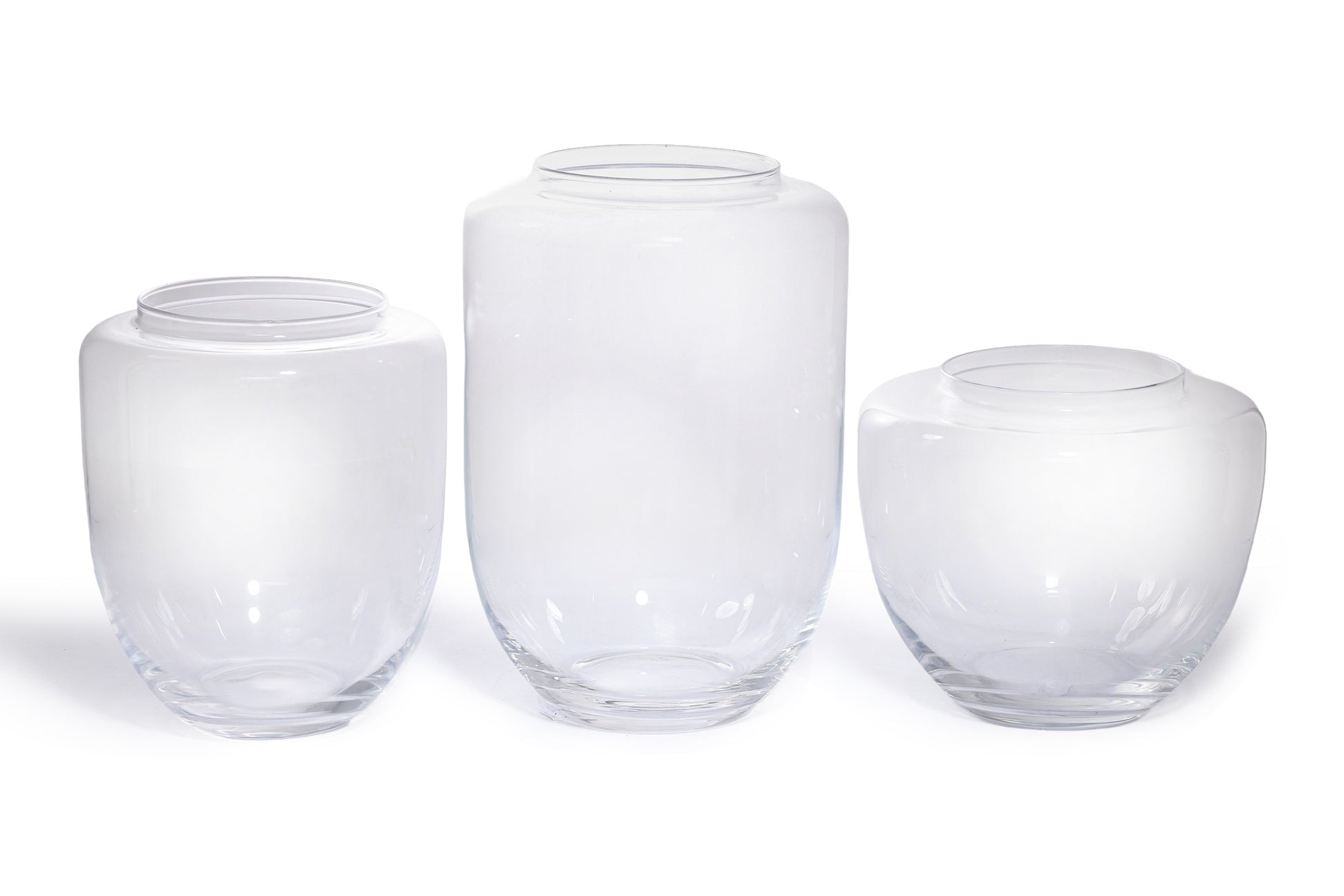 A GROUP OF THREE IVV GLASS JARS WITH COLOURED LIDS