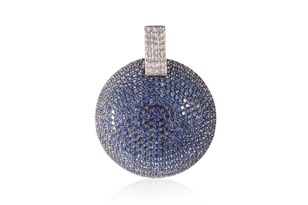 A LARGE SAPPHIRE GRADIENT AND DIAMOND PENDANT